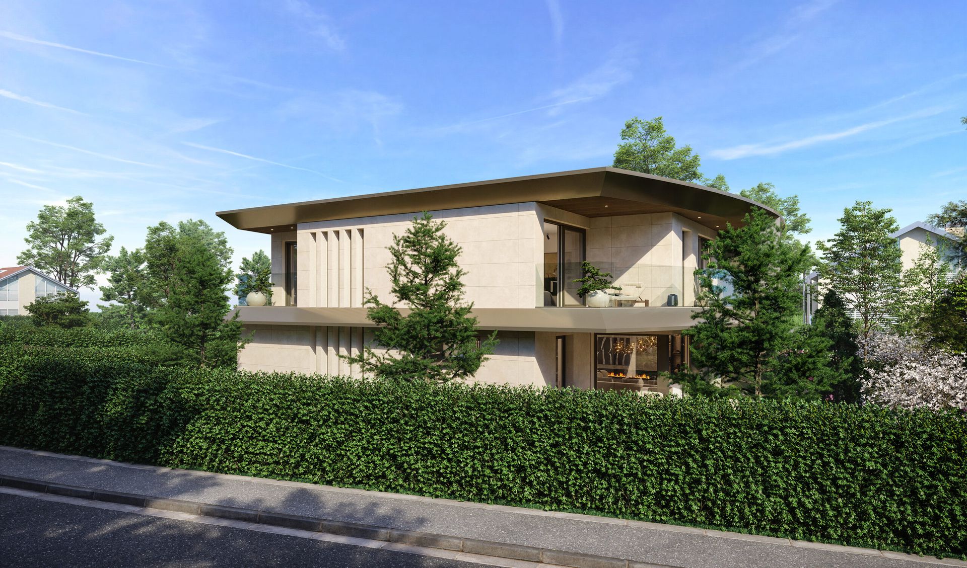 Les villas vues depuis l'avenue, derrière la haie paysagère